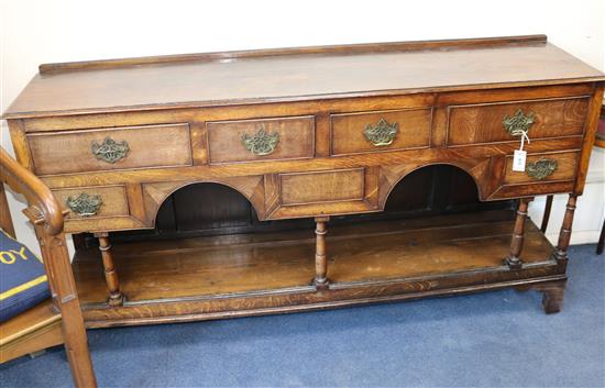 An early 18th century Welsh oak dresser base W.177cm